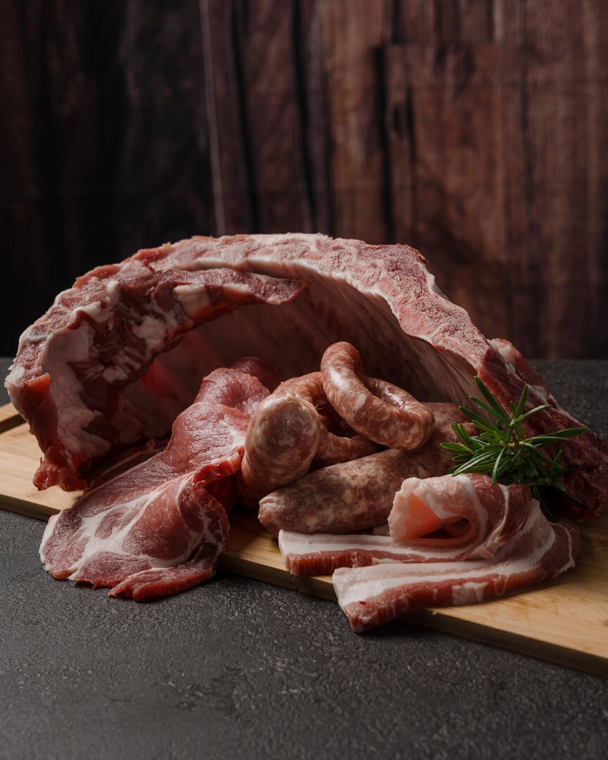 Tagli di carne suina fresca con salsicce e pancetta Carlo Poma